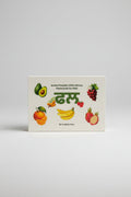 Flashcards for kids with illustrations of fruits on a gray surface
